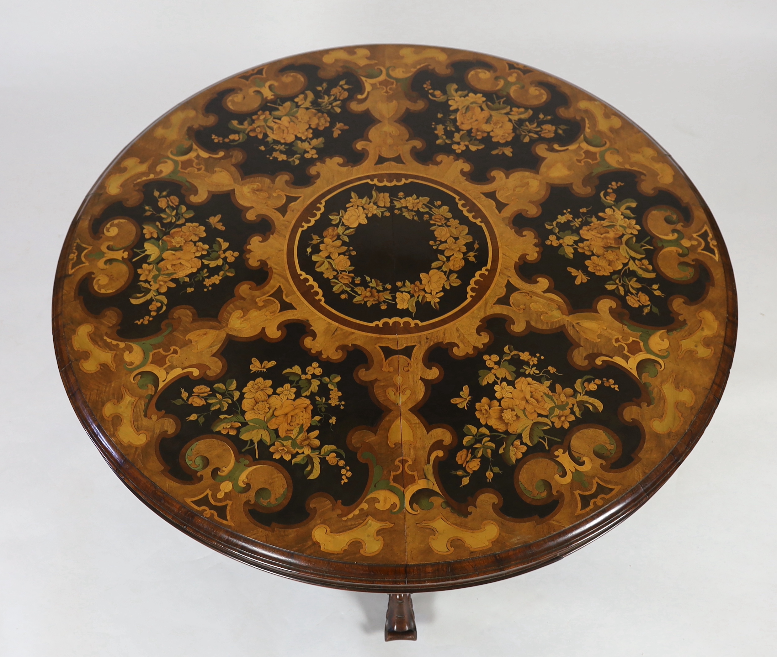 A Victorian and later marquetry inlaid walnut and rosewood breakfast table, diameter 132cm, height 74cm